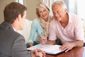 Retired Couple Working With Advisor