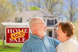 Couple In Front Of Home For Sale