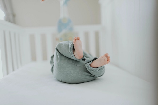 Baby Feet in Crib