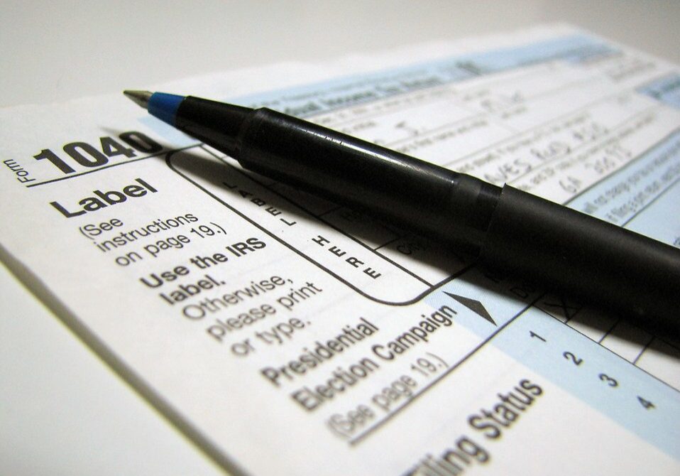 2481 Closeup Of A 1040 Tax Form And A Pen Pv