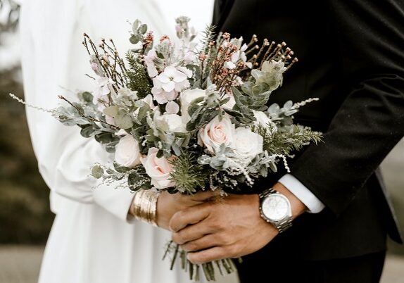 Bride and Groom with Flowers